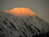 07 First Rays Of Sunrise Strike La Grande Barriere and Tilicho Peak Close Up From Manang
